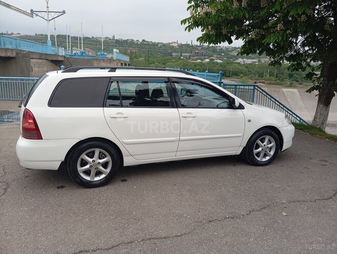 Toyota Corolla 2005, 260,000 km - 1.4 l - Quba
