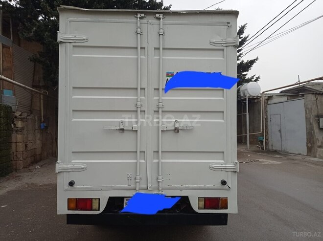 Isuzu NKR 55 L 2008, 301,577 km - 2.9 л - Bakı