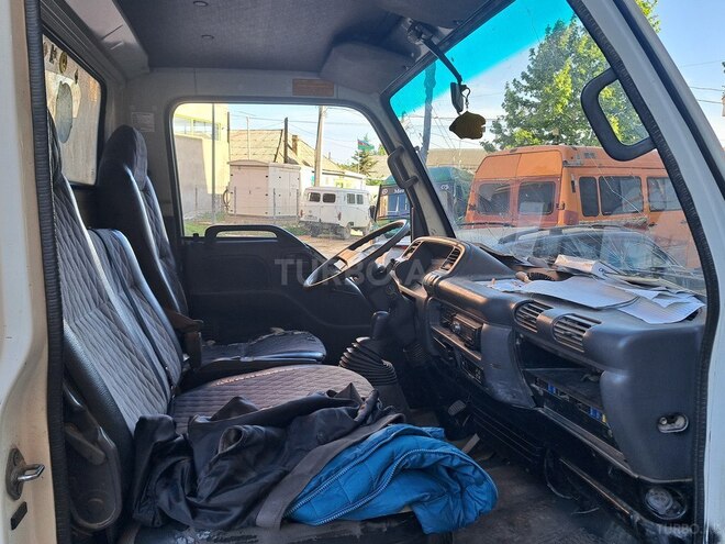 Isuzu NKR 55 L 2008, 254,700 km - 2.8 л - Salyan