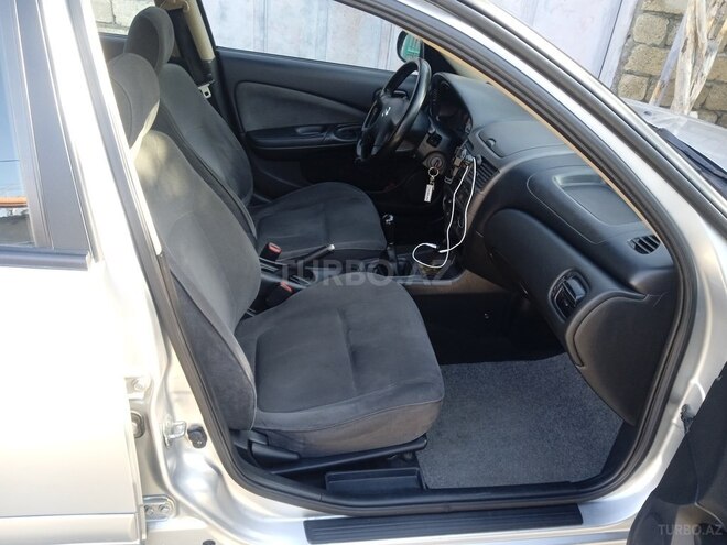 Nissan Sunny 2006, 293,000 km - 1.3 l - Bakı
