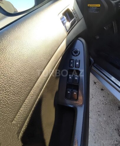 Kia Optima 2011, 246,000 km - 2.0 л - Xudat