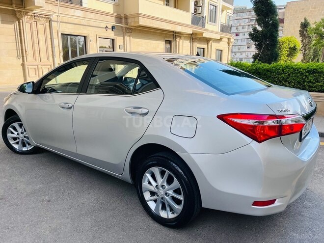 Toyota Corolla 2015, 98,000 km - 1.6 l - Bakı
