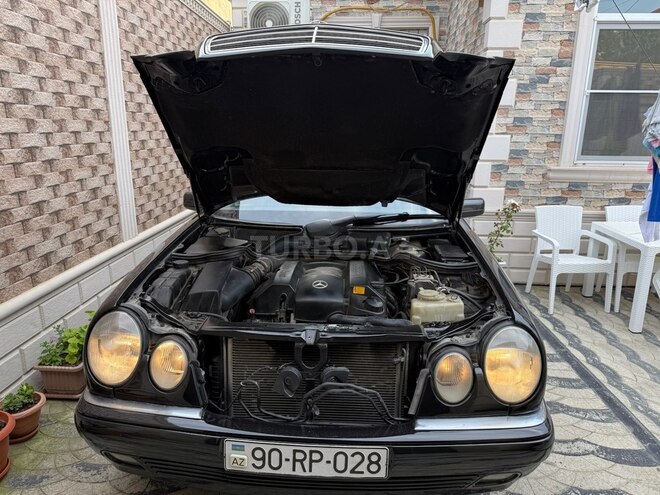 Mercedes E 240 1999, 304,402 km - 2.6 l - Bakı