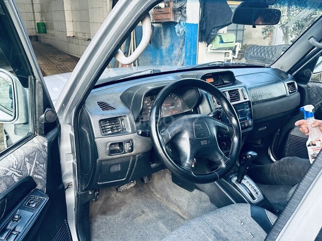 Mitsubishi Pajero io 1999, 321,321 km - 1.8 l - Bakı