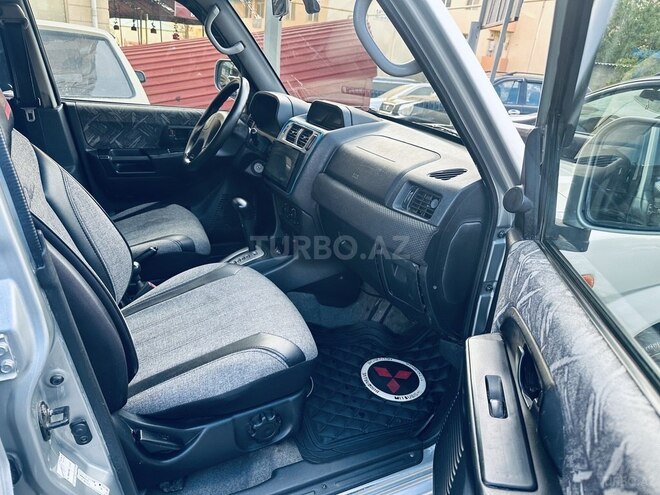 Mitsubishi Pajero io 1999, 321,321 km - 1.8 l - Bakı