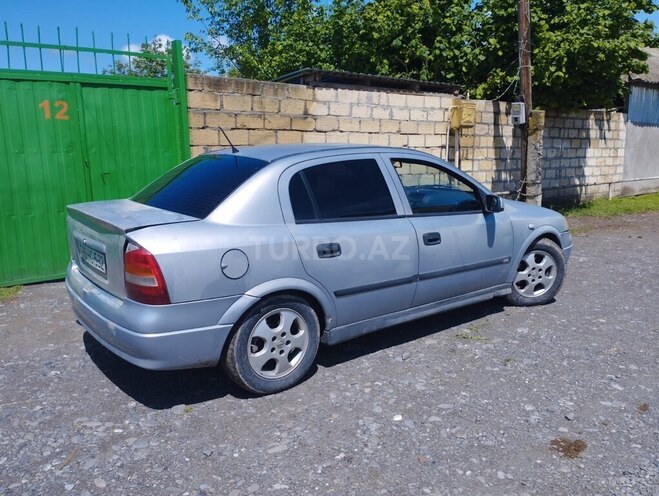 Opel Astra 2001, 250,000 km - 2.0 л - Oğuz