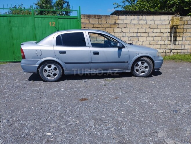 Opel Astra 2001, 250,000 km - 2.0 л - Oğuz