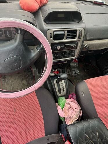 Mitsubishi Pajero io 1999, 380,000 km - 1.8 л - Bakı