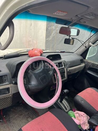 Mitsubishi Pajero io 1999, 380,000 km - 1.8 л - Bakı