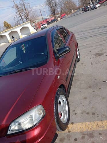 Opel Astra 1998, 544,466 km - 1.6 l - Qax