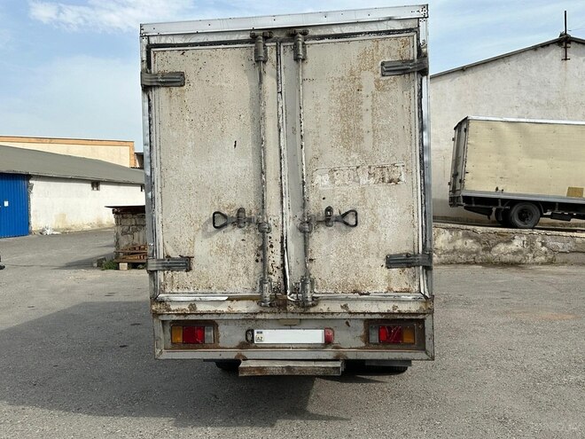 Isuzu NKR 55 L 2008, 519,410 km - 2.8 л - Bakı
