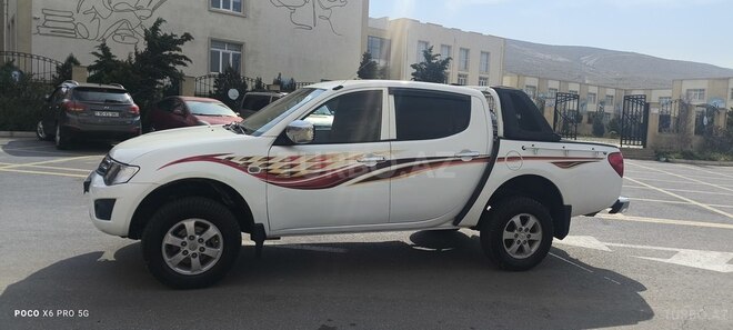 Mitsubishi L200 2015, 234,000 km - 2.5 l - Bakı