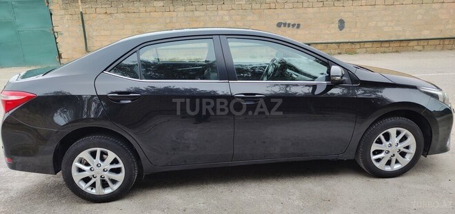 Toyota Corolla 2014, 174,000 km - 1.6 l - Bakı