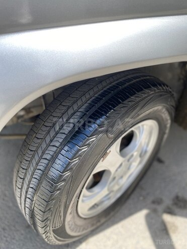 Mitsubishi Pajero io 1999, 350,000 km - 1.8 l - Bakı
