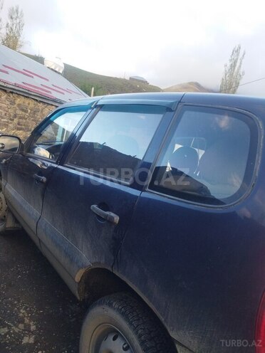 Chevrolet Niva 2004, 360,550 km - 1.7 l - Quba
