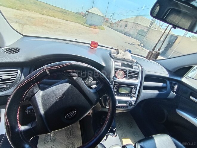 Kia Sportage 2009, 230,000 km - 2.0 л - Bakı
