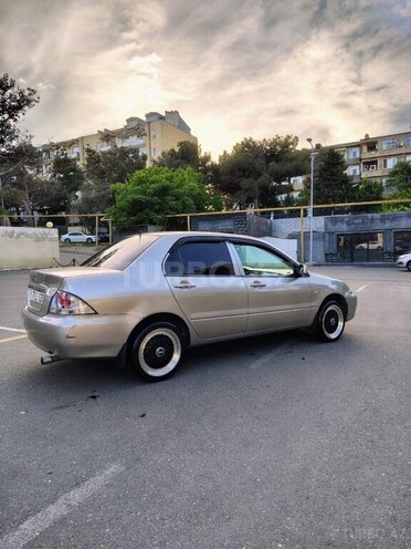 Mitsubishi Lancer 2009, 557,000 km - 1.3 l - Bakı