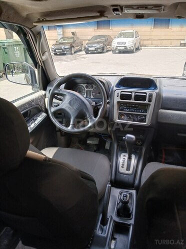 Mitsubishi Pajero io 1999, 100,000 km - 1.8 л - Bakı