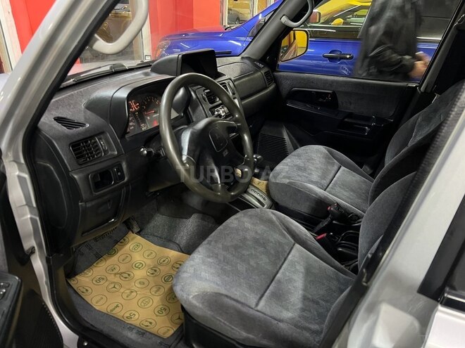 Mitsubishi Pajero io 2002, 205,000 km - 2.0 л - Sumqayıt