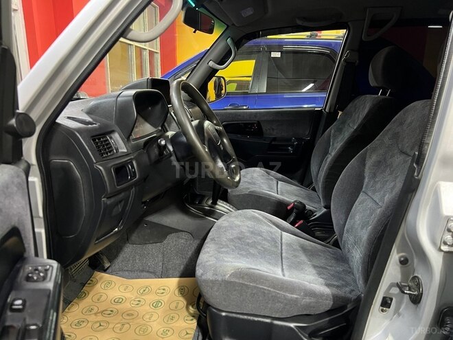 Mitsubishi Pajero io 2002, 205,000 km - 2.0 л - Sumqayıt