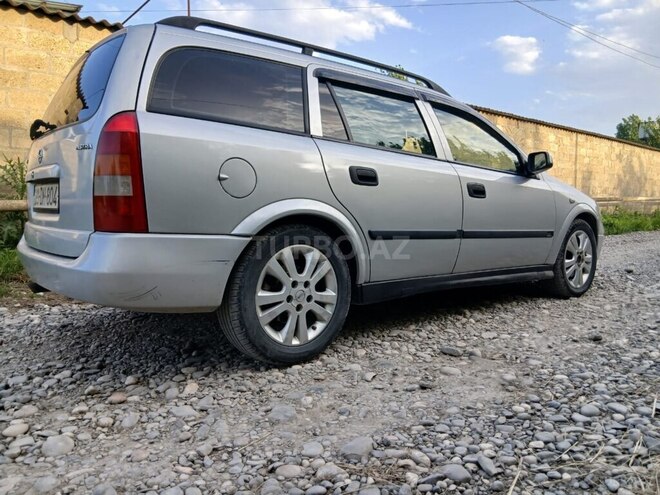 Opel Astra 2001, 200,000 km - 2.2 l - Quba