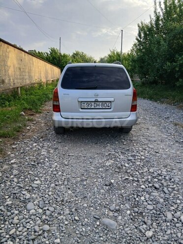Opel Astra 2001, 200,000 km - 2.2 l - Quba