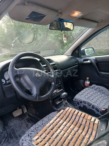 Opel Astra 2001, 200,000 km - 2.2 l - Quba