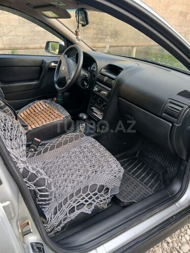 Opel Astra 2001, 200,000 km - 2.2 l - Quba