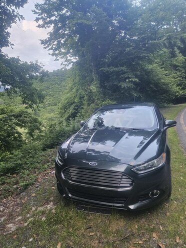 Ford Fusion (North America) 2016, 150,000 km - 2.0 l - Qax