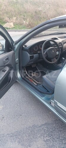 Nissan Sunny 2006, 246,000 km - 1.6 l - Bakı