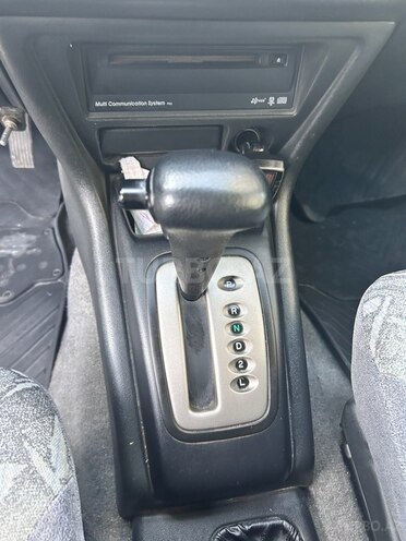 Mitsubishi Pajero io 1999, 239,840 km - 2.0 l - Bakı