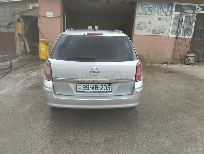 Opel Astra 2010, 318,000 km - 1.4 l - Qusar