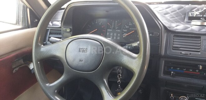 Kia  1994, 350,000 km - 1.5 l - Qax