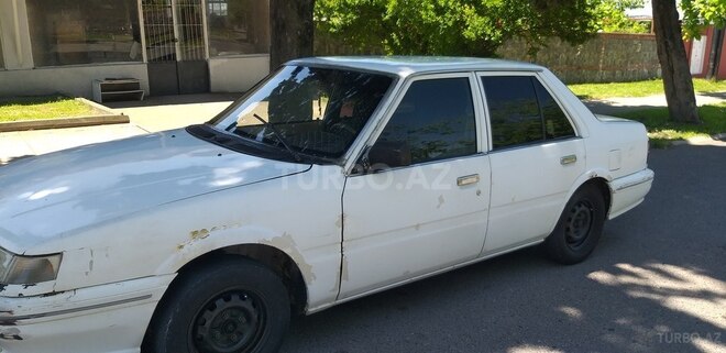 Kia  1994, 350,000 km - 1.5 l - Qax