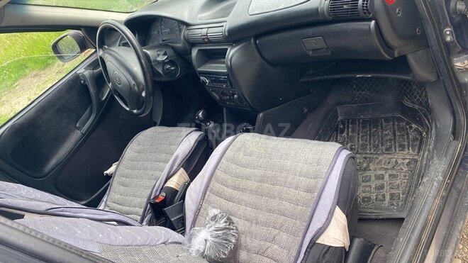 Opel Astra 1996, 290,000 km - 1.6 l - Qusar