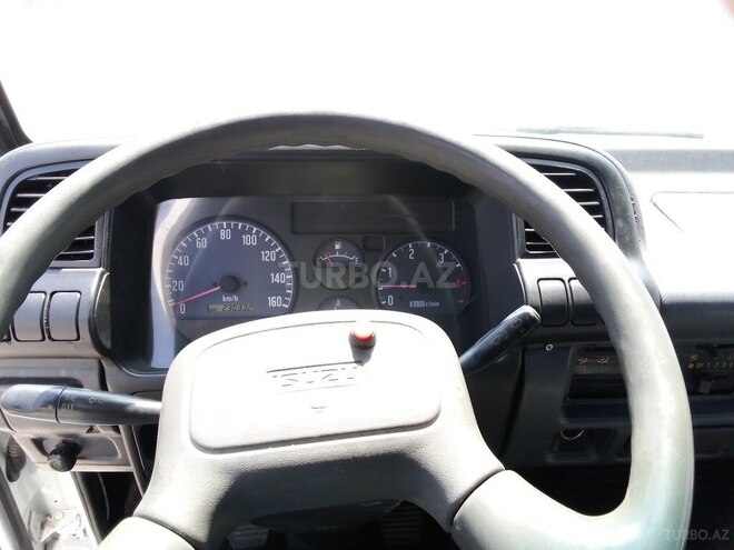 Isuzu NPR 66 P 2009, 230,000 km - 4.3 l - Bakı