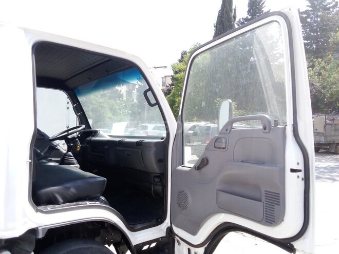 Isuzu NPR 66 P 2009, 230,000 km - 4.3 l - Bakı
