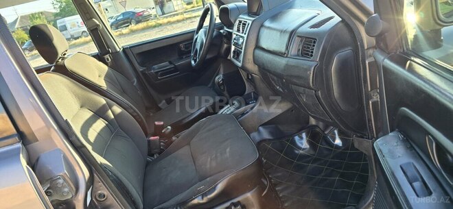Mitsubishi Pajero io 1999, 210,000 km - 1.8 л - Bakı