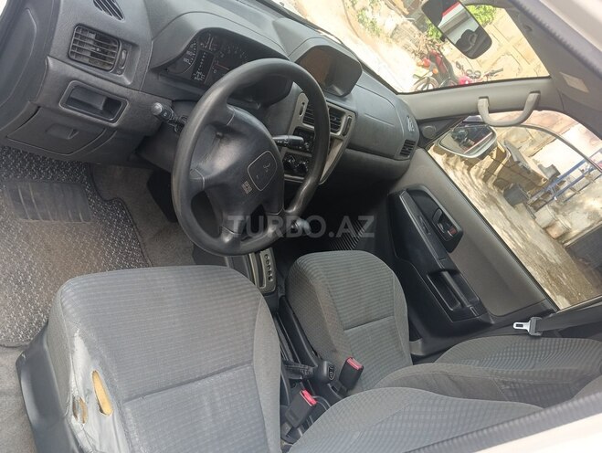 Mitsubishi Pajero io 1999, 250,000 km - 1.8 l - Bakı