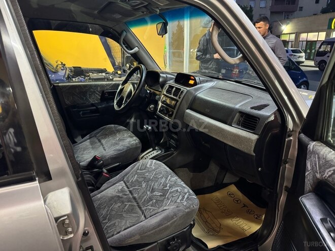 Mitsubishi Pajero io 1999, 260,000 km - 1.8 л - Sumqayıt
