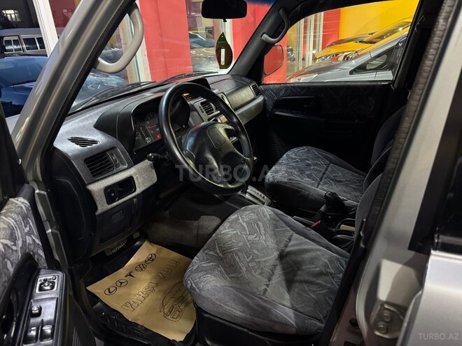Mitsubishi Pajero io 1999, 260,000 km - 1.8 л - Sumqayıt