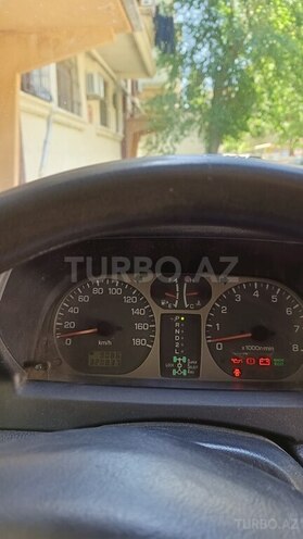 Mitsubishi Pajero io 1999, 320,800 km - 1.8 л - Bakı