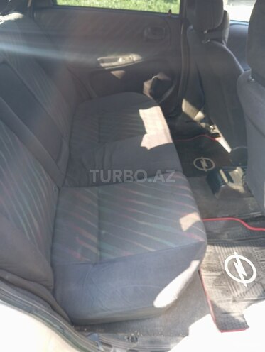 Opel Astra 1996, 364,557 km - 1.6 l - Qax