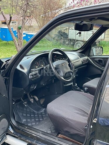 Chevrolet Niva 2007, 130,000 km - 1.7 l - Qax
