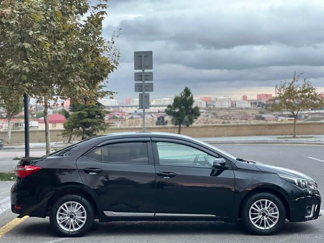 Toyota Corolla 2014, 176,000 km - 1.6 l - Bakı