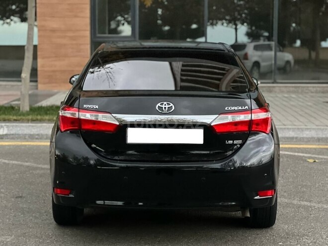 Toyota Corolla 2014, 176,000 km - 1.6 l - Bakı
