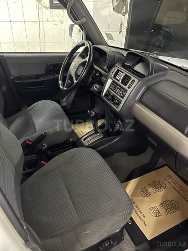 Mitsubishi Pajero io 1999, 227,574 km - 1.8 л - Bakı