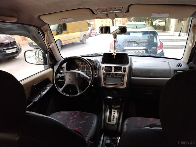 Mitsubishi Pajero io 2003, 318,000 km - 2.0 л - Bakı