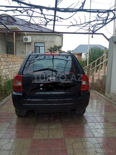 Kia Sportage 2009, 232,000 km - 2.0 l - Bakı