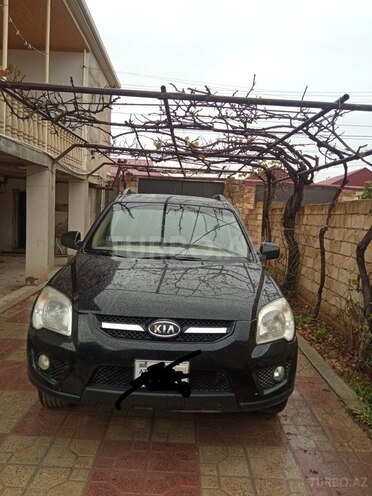 Kia Sportage 2009, 232,000 km - 2.0 l - Bakı